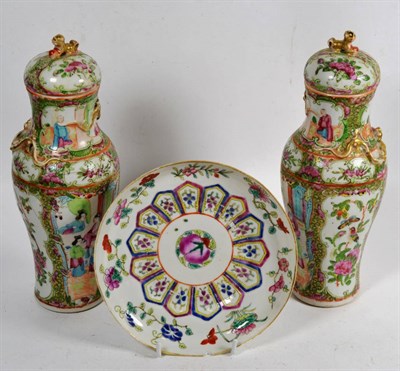 Lot 15 - A pair of Chinese Canton famille rose vases and covers; and a porcelain famille rose dish...
