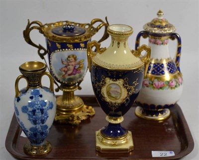 Lot 22 - A Coalport twin handled vase; and three other twin handled vases