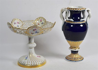 Lot 32 - A Meissen floral and gilt decorated centrepiece, with blue ground and gilt decorated...
