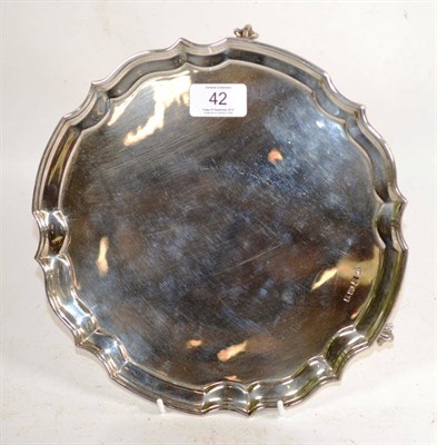 Lot 42 - An Elizabeth II silver waiter, by Bishton's Ltd., Birmingham, 1973, shaped circular and on...