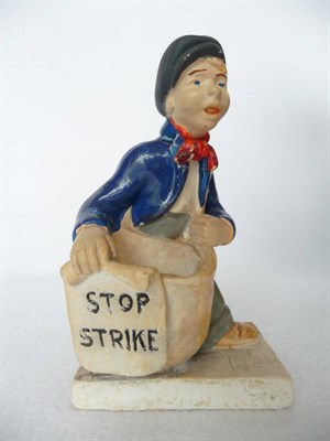 Lot 29 - A Composition General Strike Commemorative Match Holder, circa 1926, as a paper boy in black...