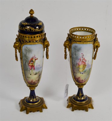 Lot 70 - A pair of 19th century Sevres style, gilt metal mounted twin handled covered vases, decorated...
