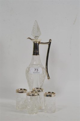 Lot 73 - A silver-mounted cut-glass decanter, and four silver-mounted cut-glass cups (5)