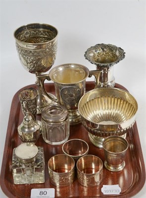 Lot 80 - A group of silver including a Victorian goblet, a vase, Sheffield, a silver cup engraved as a...