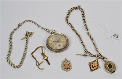 Lot 85 - A silver pocket watch, and chain