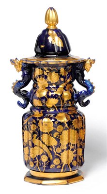Lot 34 - A Mason's Ironstone Alcove Vase, circa 1820, of fluted baluster form with dragon handles, gilt with