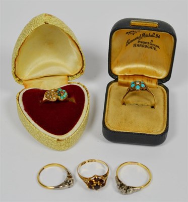 Lot 110 - A 22 carat gold turquoise and seed pearl ring, finger size R, a 9 carat gold garnet ring,...