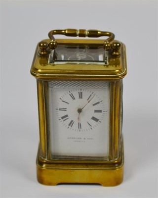 Lot 135 - A brass miniature carriage timepiece, retailed Scholen & Born, Ipswich