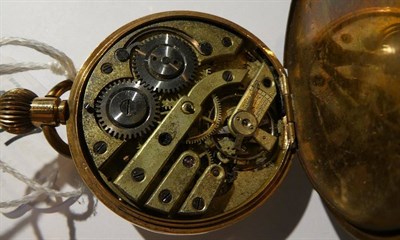 Lot 137 - A half hunter pocket watch, case stamped 14K