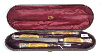 Lot 147 - A Victorian silver-mounted horn carving set, the silver mounts by Joseph Rodgers and Sons,...