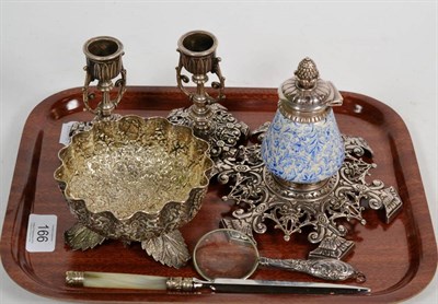 Lot 166 - A 19th century white metal and porcelain inkwell, together with a pair of matching dwarf...
