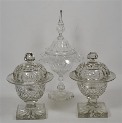 Lot 174 - A pair of cut glass sweet meat pedestal jars and covers, and another similar (3)