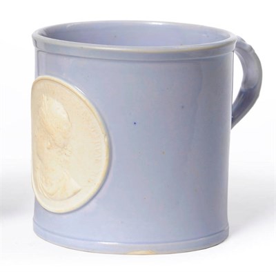 Lot 41 - A Staffordshire Lilac Glazed Porcelain George IV Commemorative Mug, circa 1829, of cylindrical form