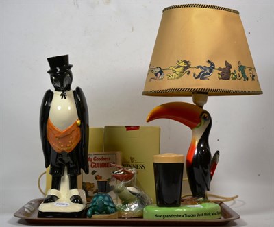 Lot 189 - A Carltonware Guinness lamp; with other items