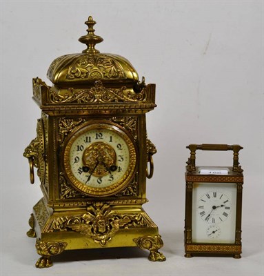 Lot 196 - A brass striking mantel clock, and a brass carriage timepiece (2)