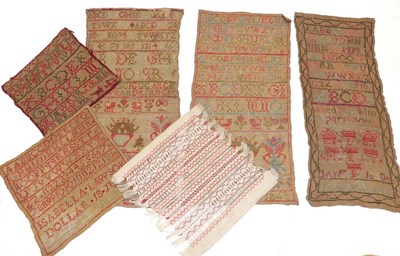 Lot 220 - Five Georgian/Victorian needlework alphabet samplers, in Algerian eyelet and cross stitch unframed