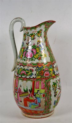 Lot 241 - A Cantonese porcelain water jug, mid 19th century, of baluster form, typically painted in...