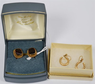 Lot 275 - A pair of 9 carat gold horseshoe earrings, with hook fittings, and a pair of 9 carat gold...