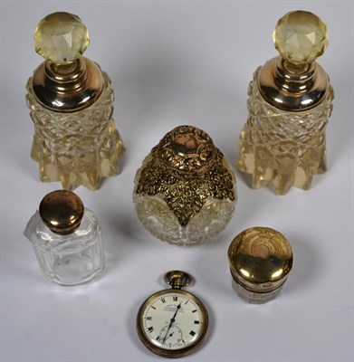 Lot 285 - A pair of silver mounted cut glass scent bottles, three other silver mounted scent bottles, a...