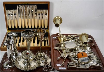 Lot 302 - A collection of assorted silver-plate, including a snuffer and pair of candlesticks, a wall-sconce