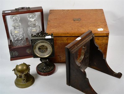 Lot 306 - A 19th century brass inkwell in the form of three chained dogs, facing outward holding a sphere...