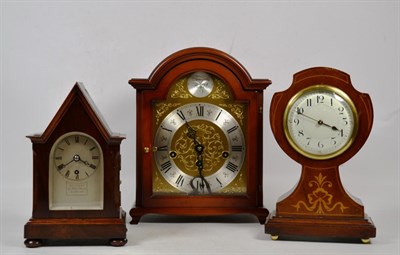 Lot 308 - An Edwardian inlaid mahogany mantle timepiece, another mahogany timepiece signed Kleyser & co,...