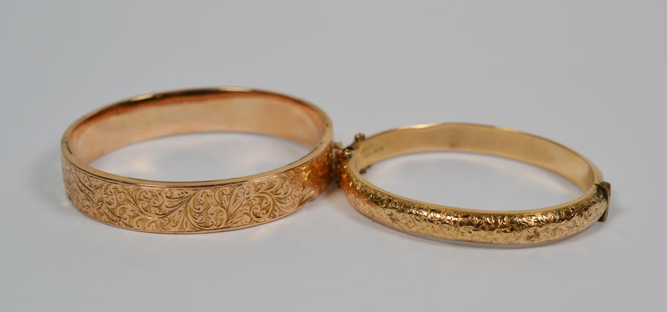 Lot 358 - Two 9 carat gold half engraved hinged bangles