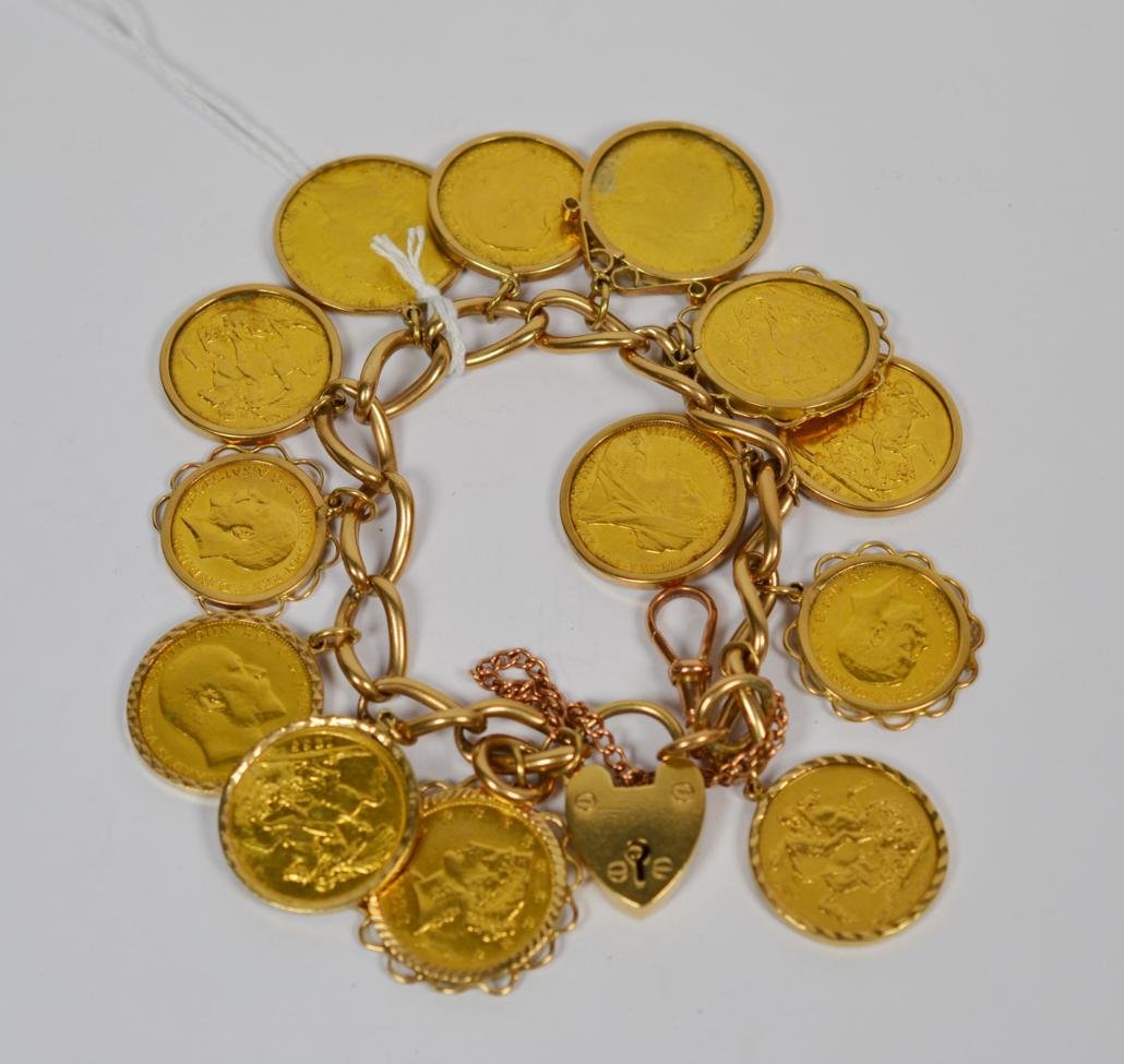Lot 360 - A curb bracelet, each link stamped '9' '.375', hung with 13 coins including an American coin,...
