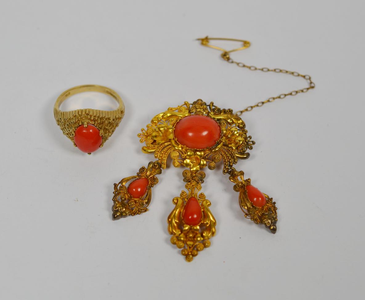 Lot 361 - A coral brooch with three pendant drops, measures 3.7cm by 5.2cm, together with a 9 carat gold...