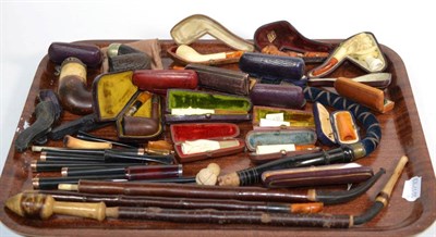 Lot 373 - A tray, containing a large collection of 19th century and later Meerschaum and other pipes,...