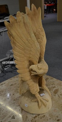 Lot 1035 - A carved wooden eagle