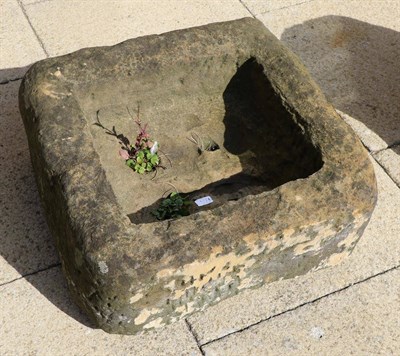 Lot 1174 - A weathered stone square trough and a rectangular example (2)