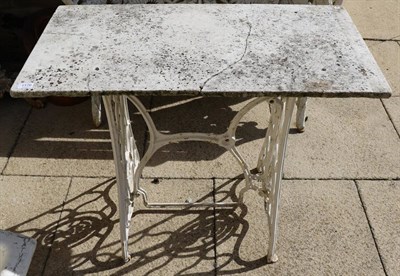 Lot 1176 - A late Victorian cast iron bird bath, Belfast sink, marble topped table with metal base,...