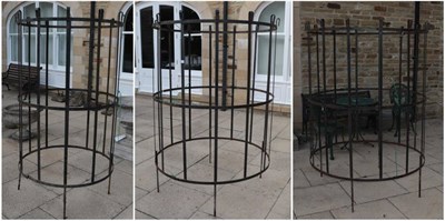 Lot 1177 - Three large wrought iron tree guards