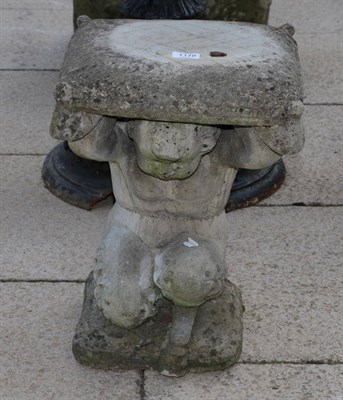 Lot 1178 - A weathered sand stone figural pedestal