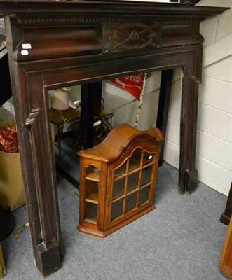 Lot 1201 - A mahogany carved fire surround