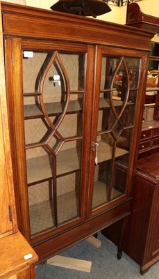 Lot 1210 - An Edwardian mahogany inlaid display cabinet