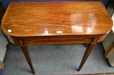 Lot 1218 - George III mahogany and tulipwood banded fold-over card table