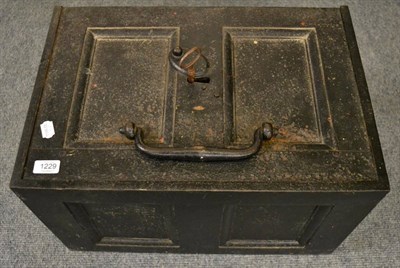 Lot 1229 - A cast iron safe with key