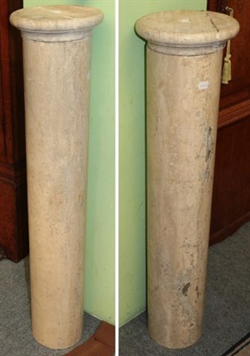 Lot 1261 - Two marble cylindrical pillars with removable circular tops, 110cm high (a.f.)