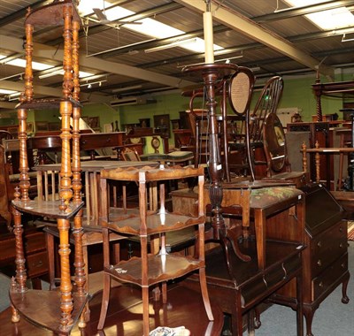 Lot 1264 - An Edwardian mahogany revolving bookcase, of square form with slatted sides, the base with...