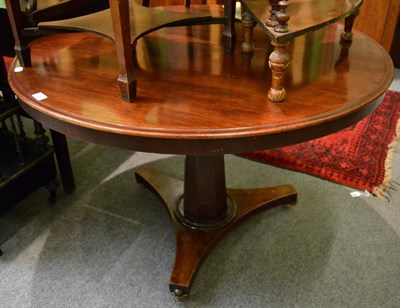 Lot 1266 - A Victorian mahogany circular breakfast table, circa 1840, on an octagonal tapering stem and...