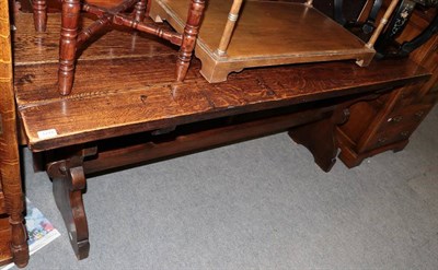 Lot 1278 - A 20th century oak plank refectory table