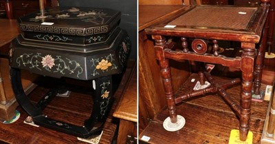 Lot 1279 - A 20th century Chinese lacquered octagonal plantstand, together with another table, raffia work top