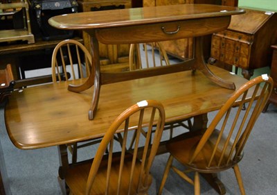 Lot 1285 - An Ercol dining table, with four dining chairs and a coffee table (6)