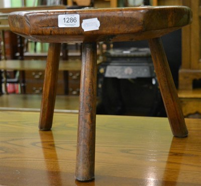 Lot 1286 - A 19th century fruitwood stool