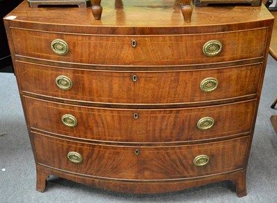 Lot 1287 - A Regency bow front chest raised on splayed legs