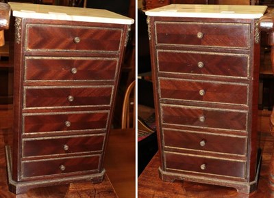 Lot 1288 - A pair of miniature 19th century mahogany six height chests of drawers with marble tops and...