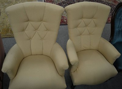 Lot 1299 - A pair of Victorian style upholstered armchairs