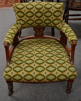 Lot 1307 - Late Victorian walnut framed armchair, later recovered in green geometric pattern fabric